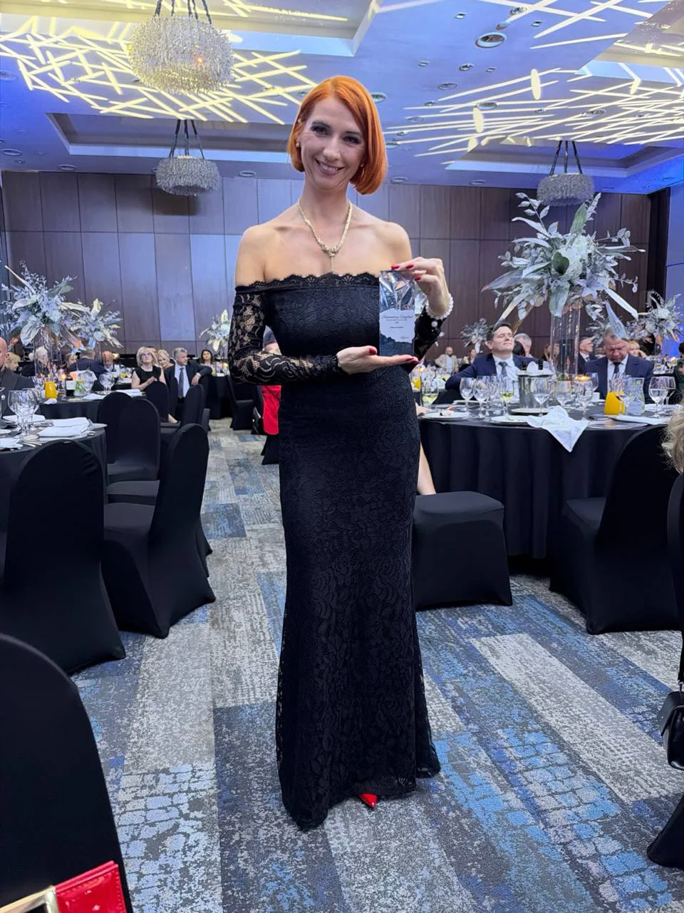 Photo with the trophy at the gala